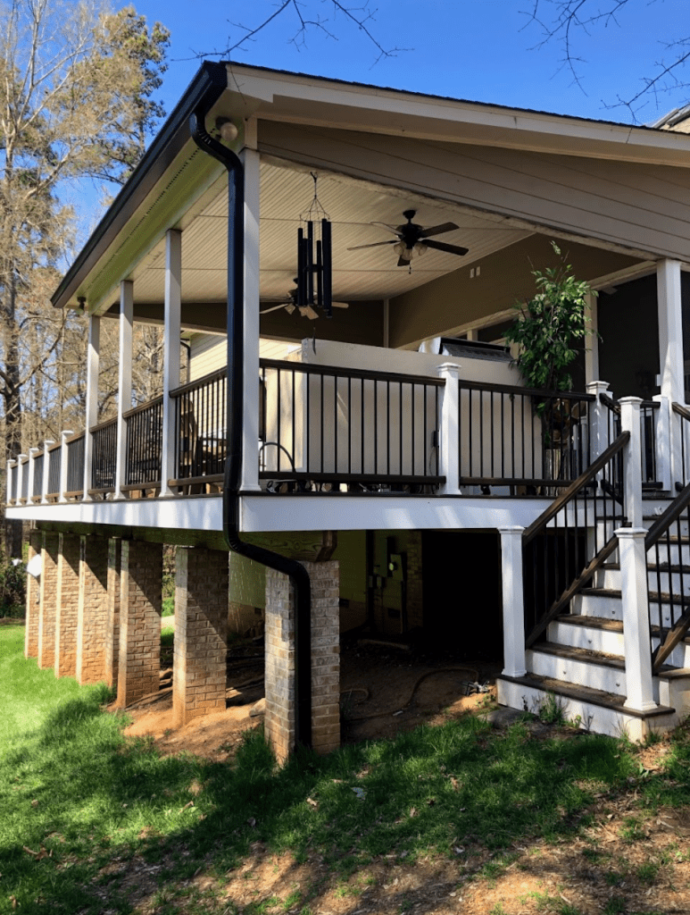 image shows two story deck from Roofline Xperts
